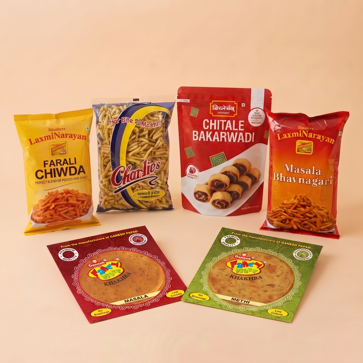 Garba Snack Box – Ganesh Methi Khakra, Ganesh Masala Khakra, LaxmiNarayan Masala Bhavnagari Sev, Charliee Bhavnagari Gathiya, Chitale Bakarwadi, LaxmiNarayan Farali Chiwda, Wooden Dandiya Sticks